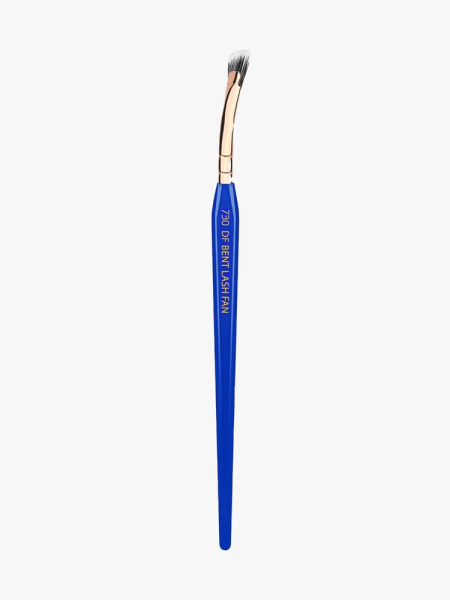 Bdellium 730 Bent Lash Fan blue and gold fan lash brush on light gray background