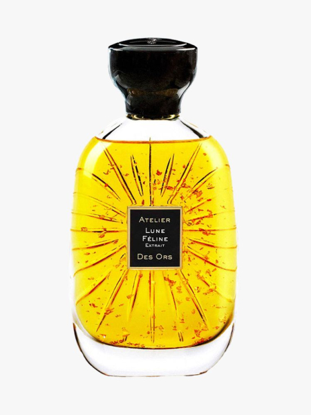 Clear bottle of Atelier Des Ors Lune Feline Extrait with a black cap on light gray background